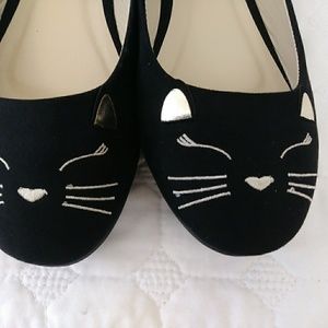 Black Slip on shoes.